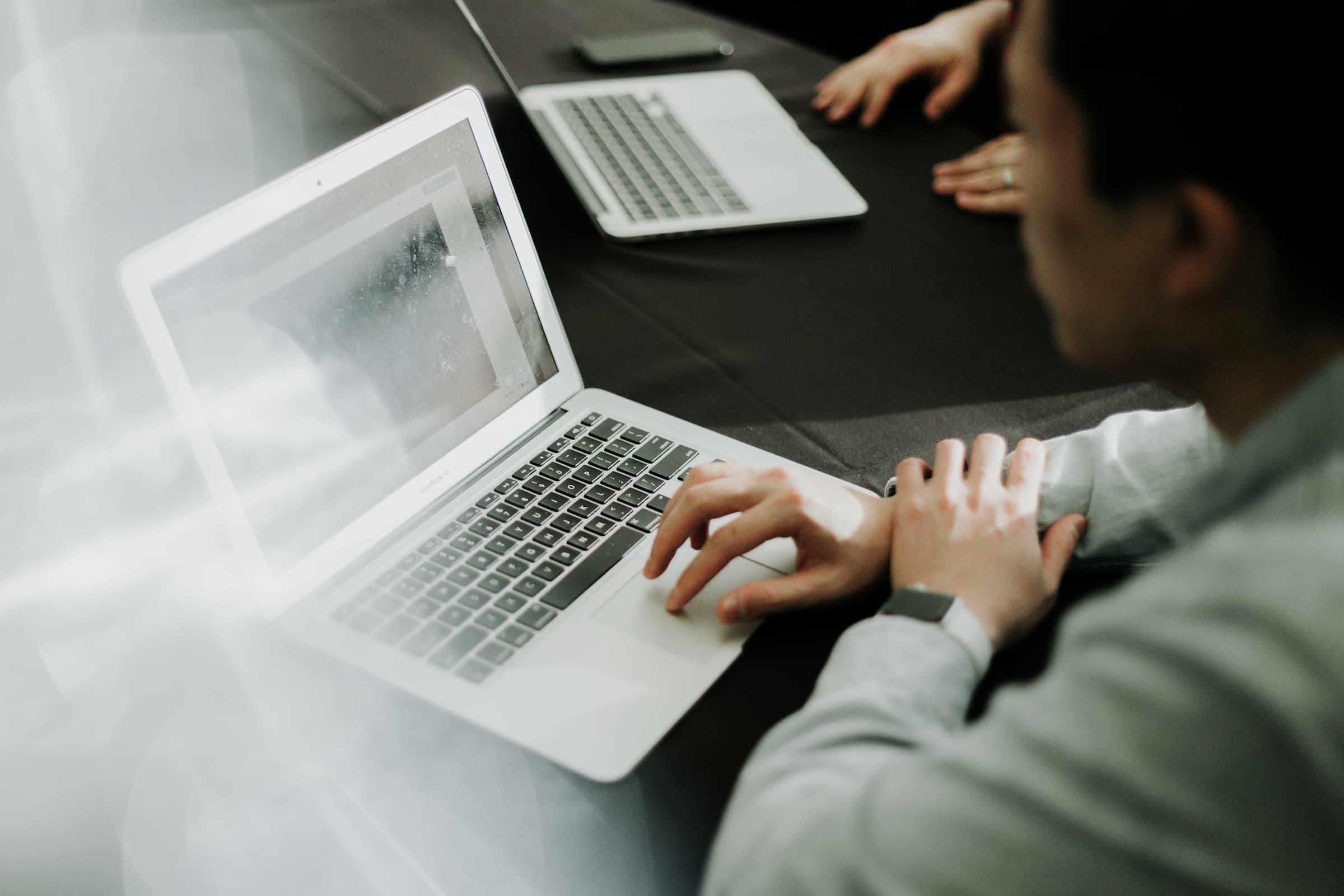 Person using MacBook Air.